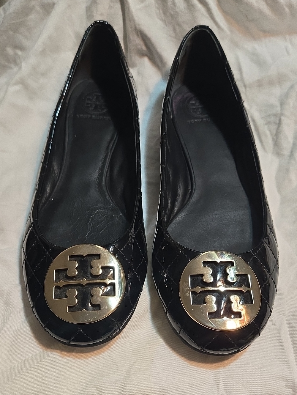 Tory Burch Black Quilted Flats with Gold Logo Medallions